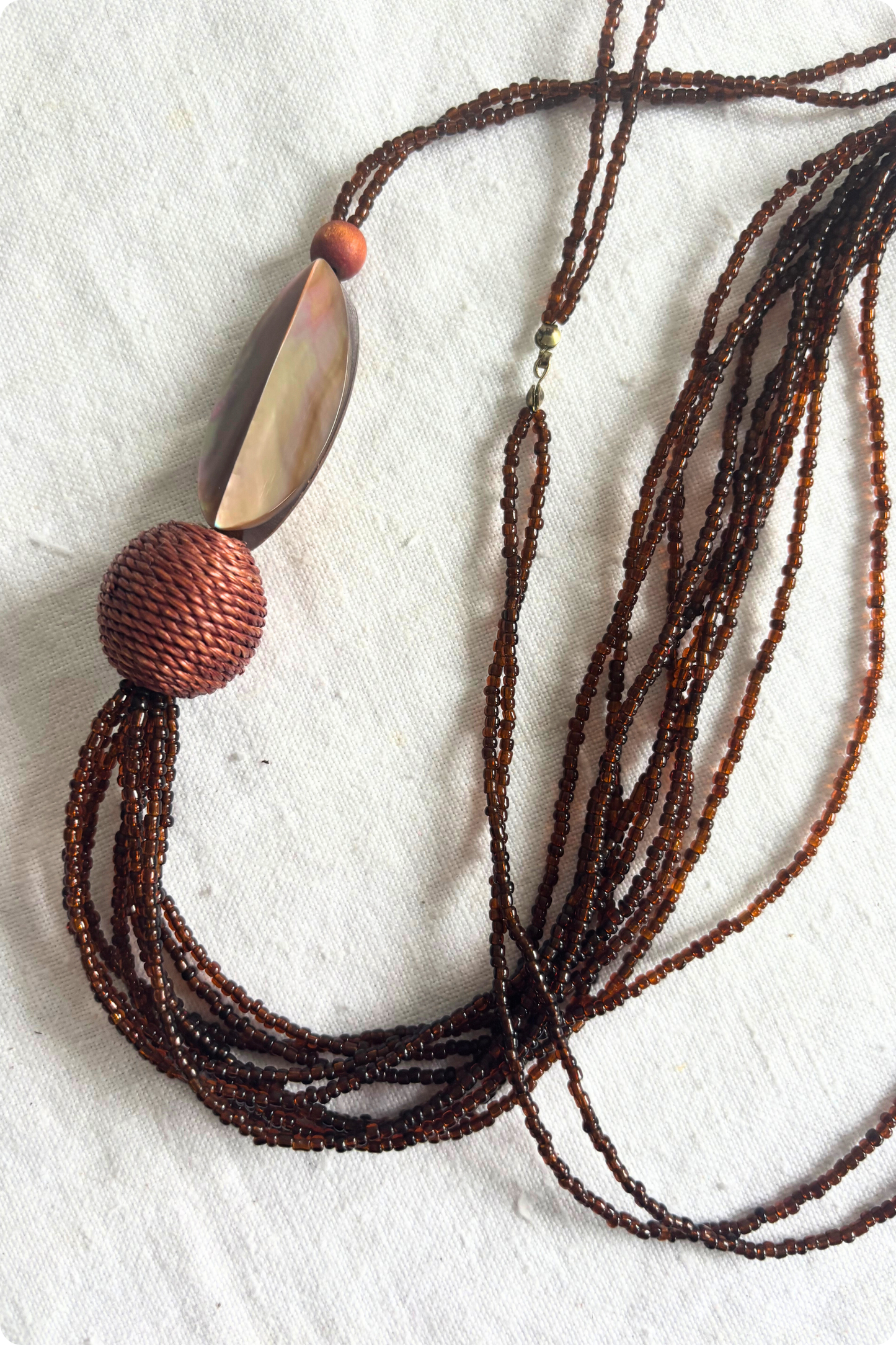 Long brown beaded necklace