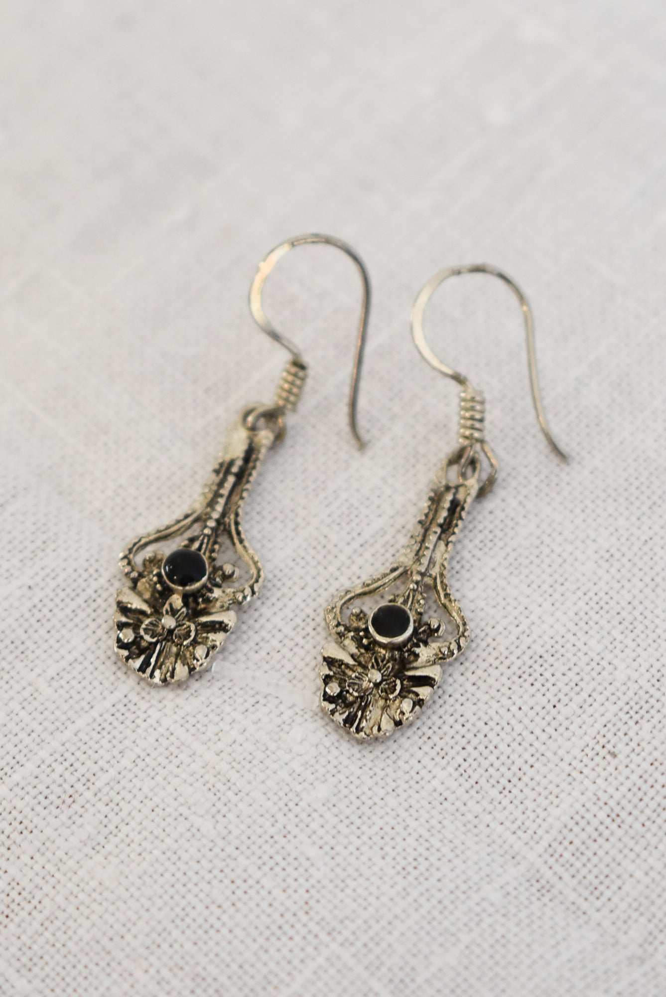 Ornate silver earrings