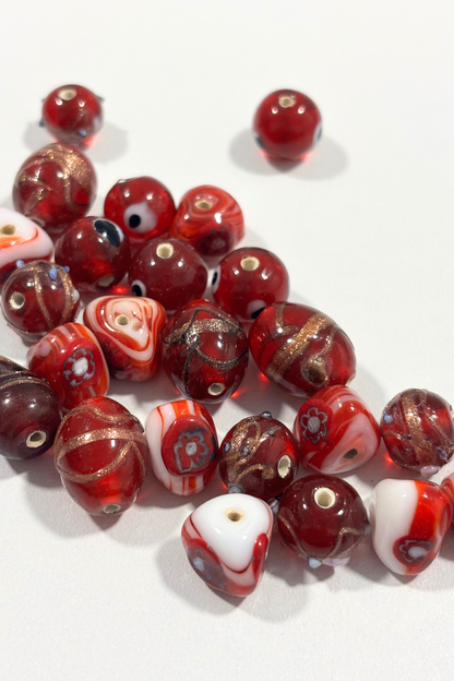 Assorted red Italian glass beads