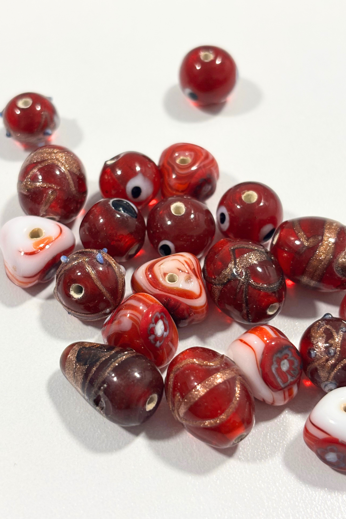 Assorted red Italian glass beads