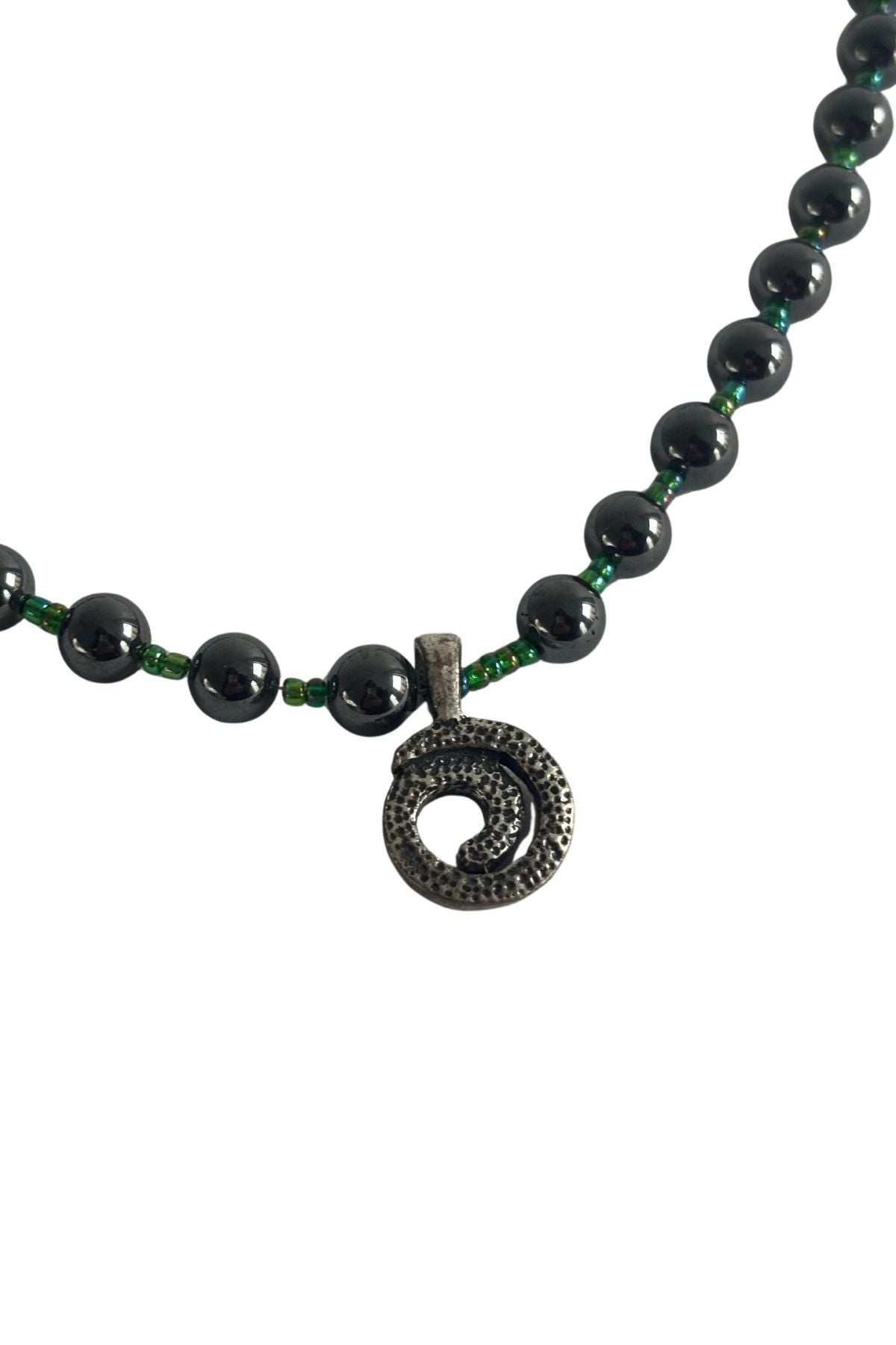 Beaded diamante koru necklace
