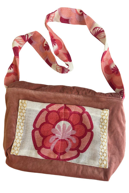 Reversible floral cross body bag