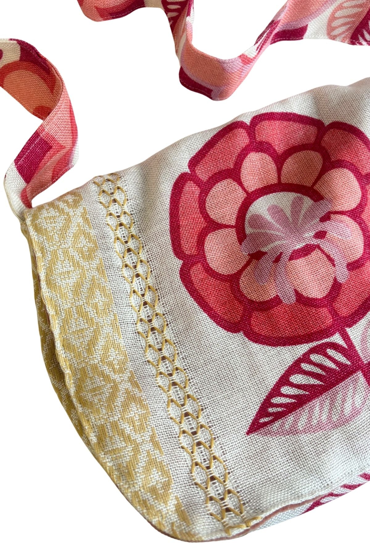 Reversible floral cross body bag