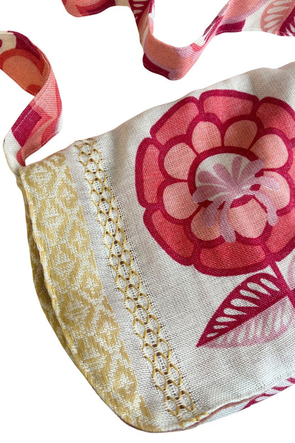 Reversible floral cross body bag