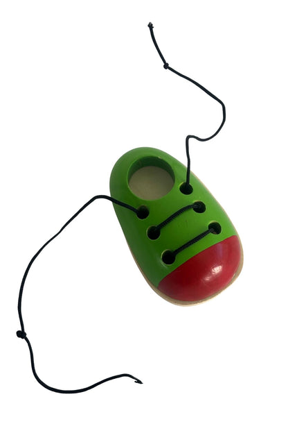 "Learn to tie your laces" wooden shoe