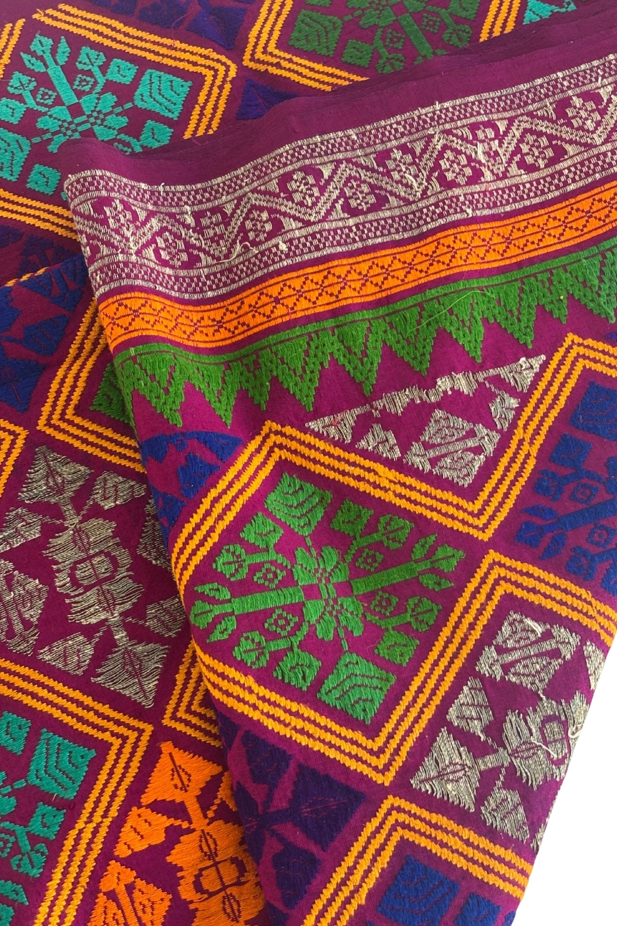 Vibrant colourful embroidered fabric