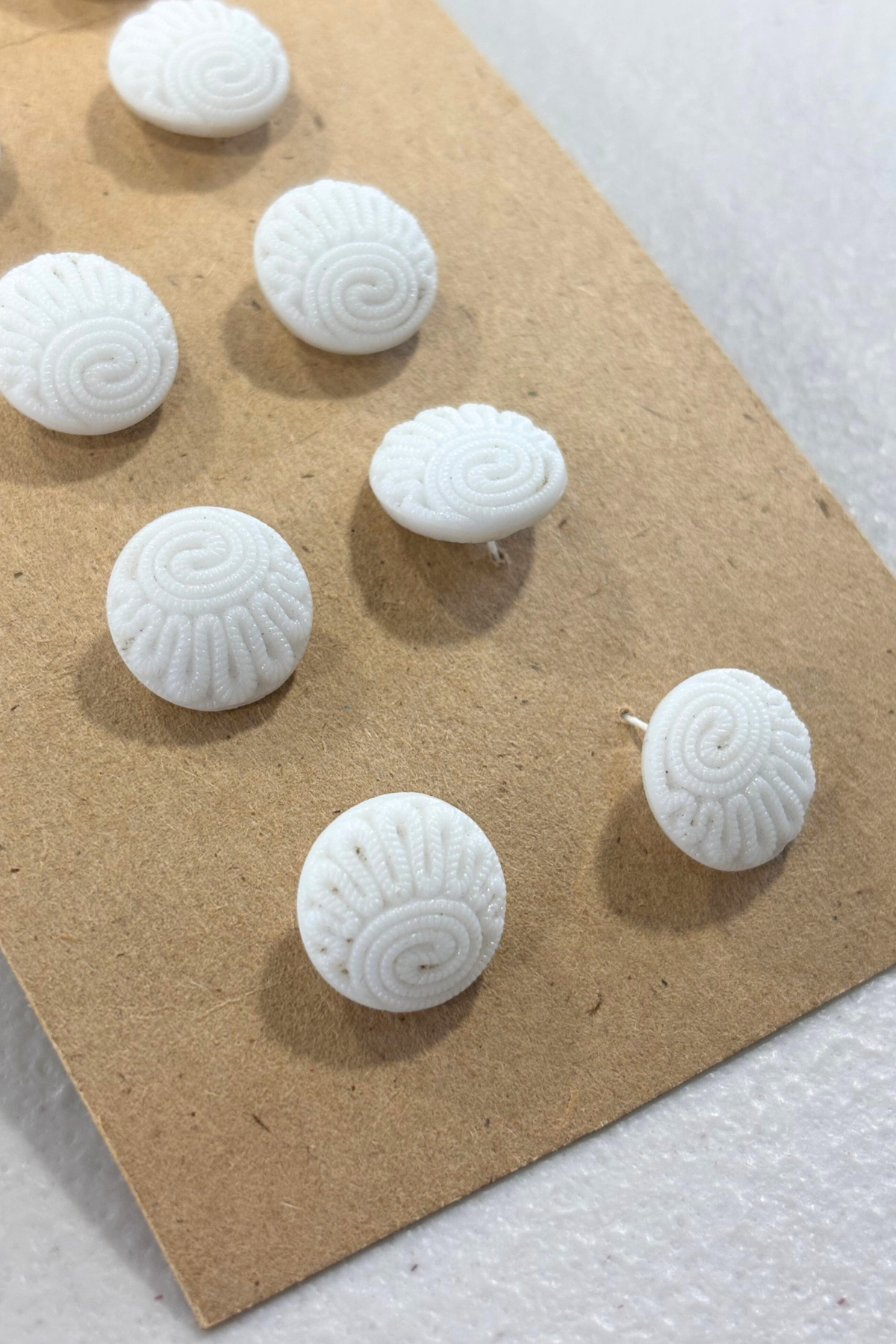 White textured vintage buttons