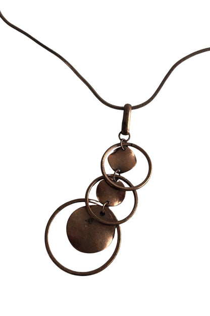 Copper toned cascading circles necklace