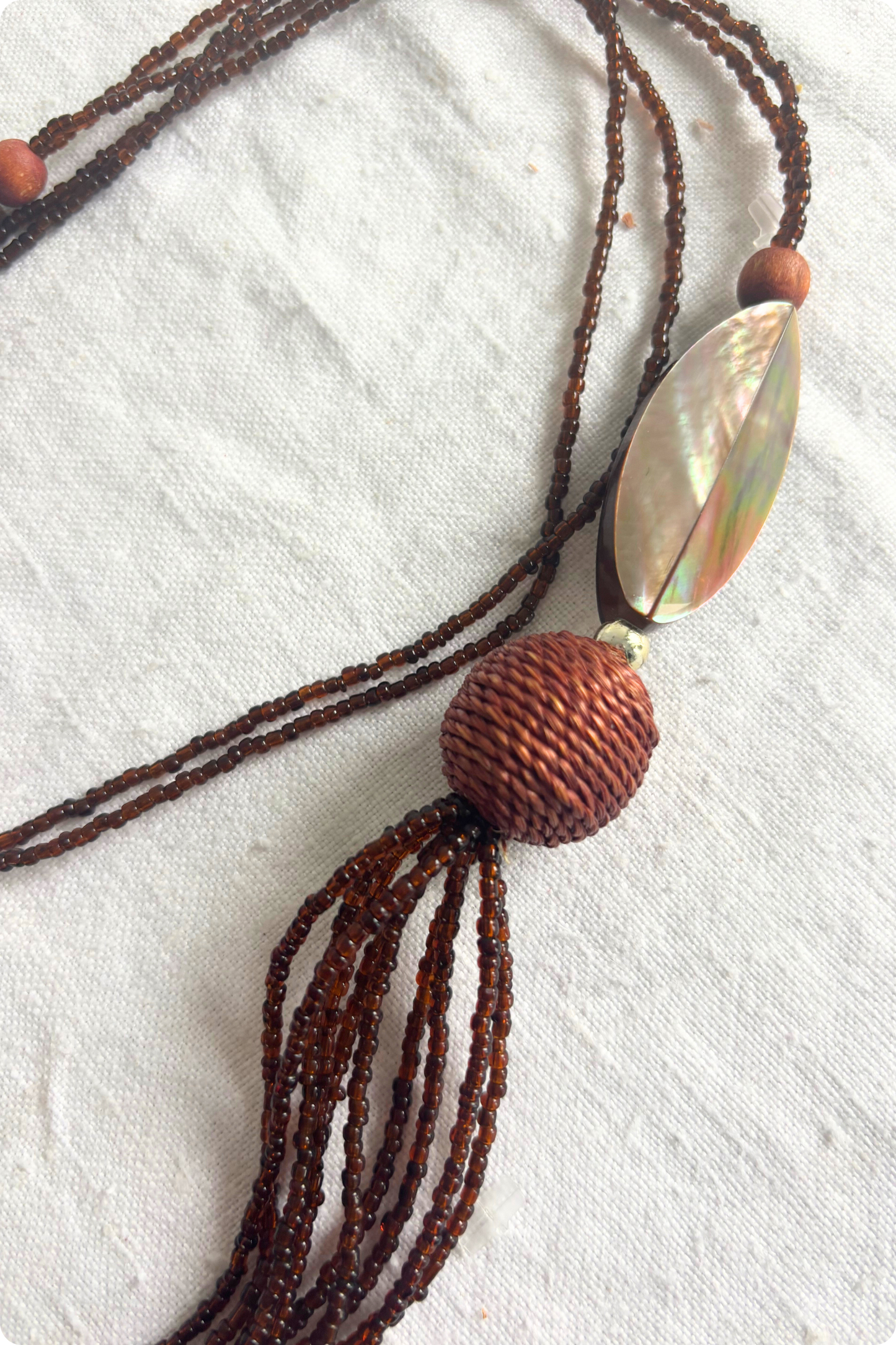 Long brown beaded necklace