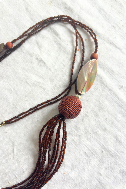 Long brown beaded necklace