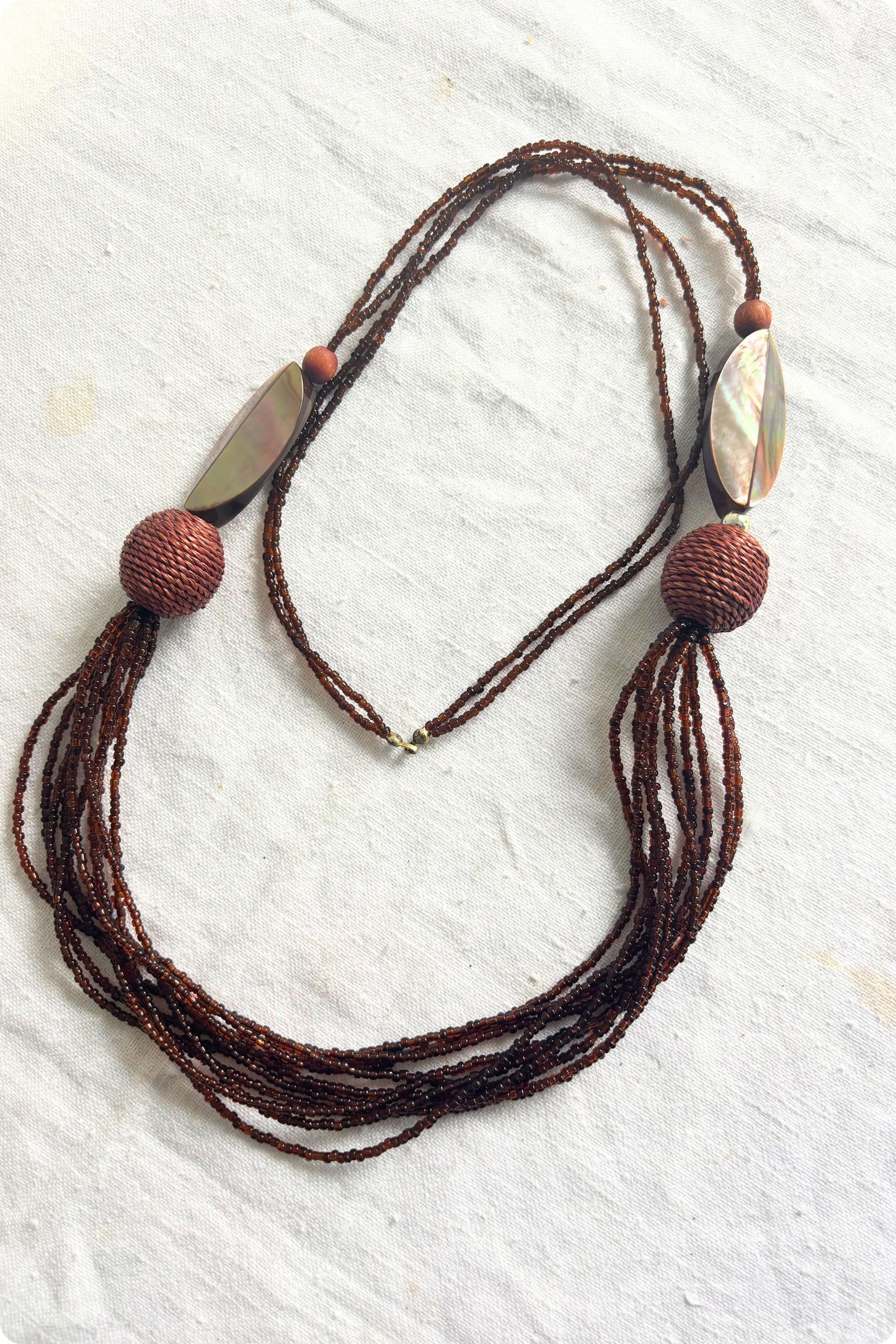 Long brown beaded necklace