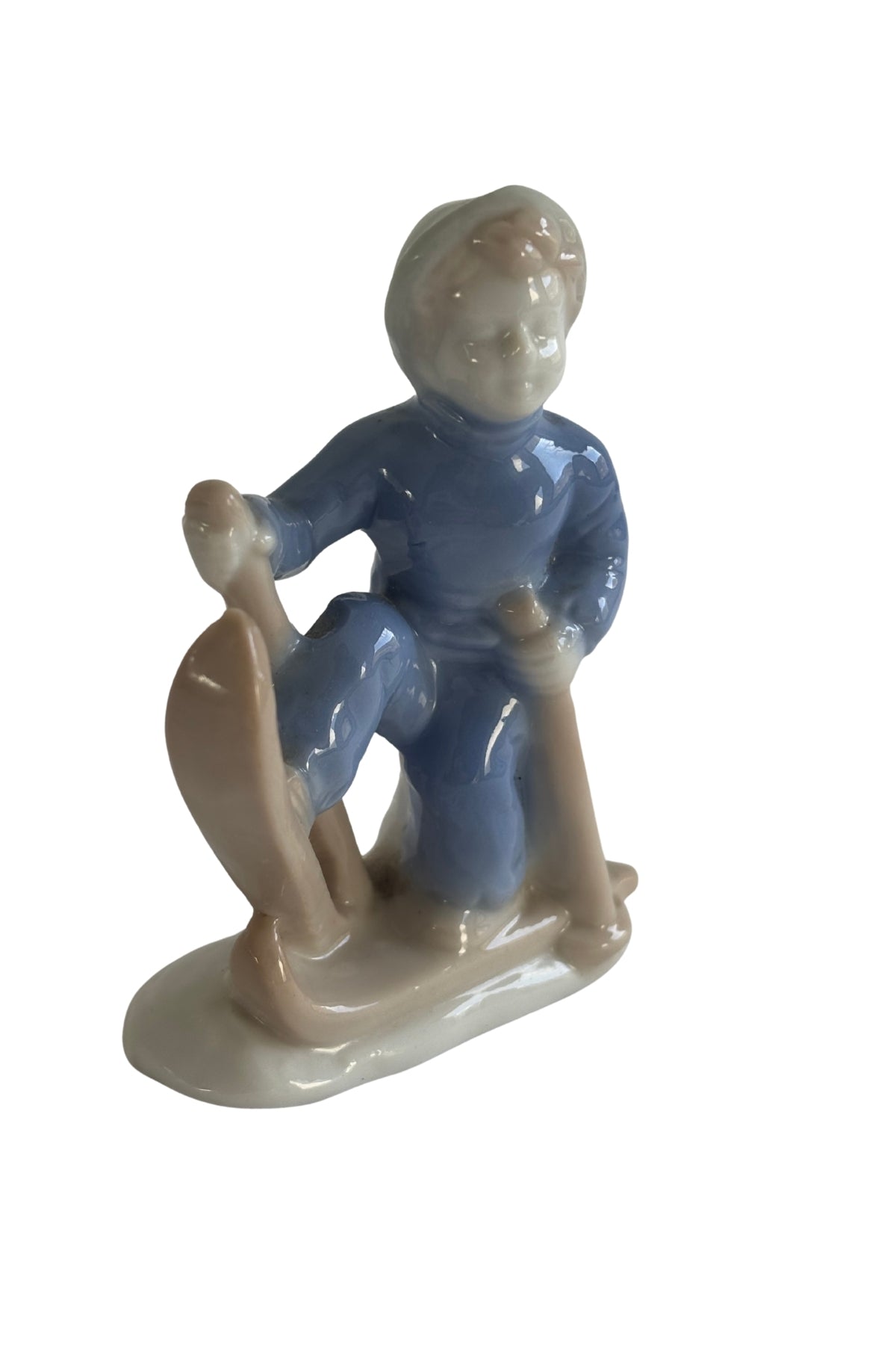 Vintage skier boy figurine