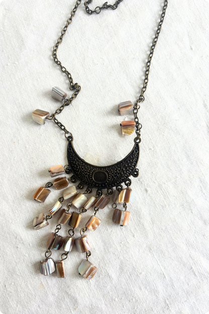 Bronzy half moon shell necklace