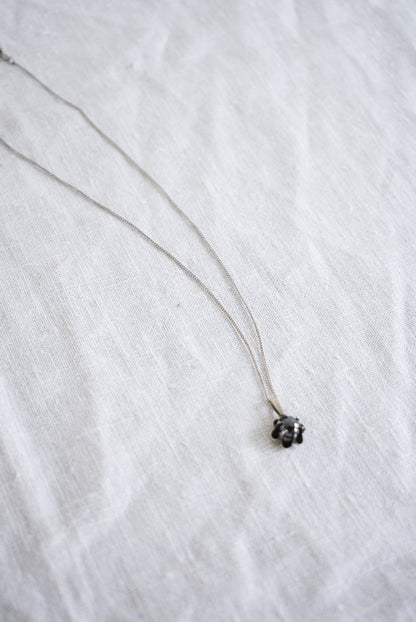 Silver necklace with flower pendant