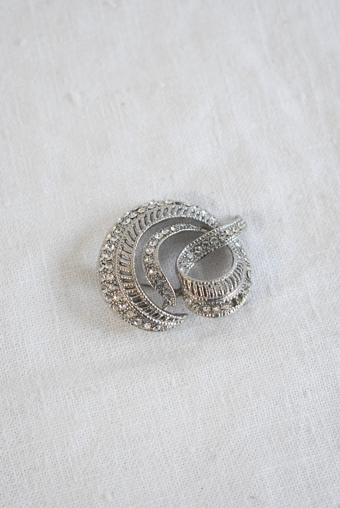 Glitz + glam circular brooch