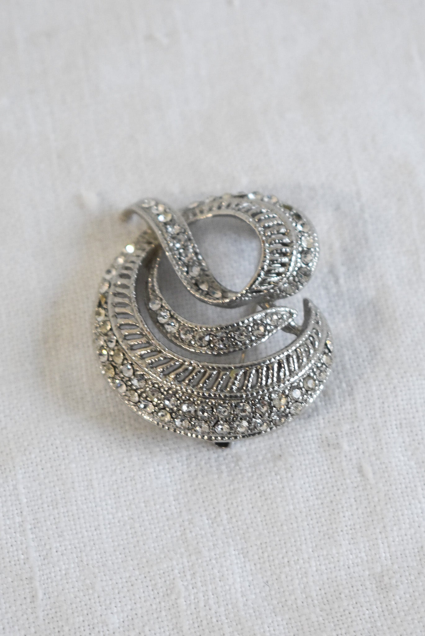 Glitz + glam circular brooch