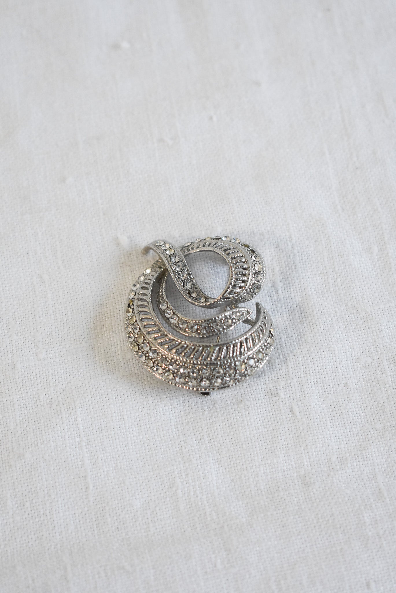 Glitz + glam circular brooch